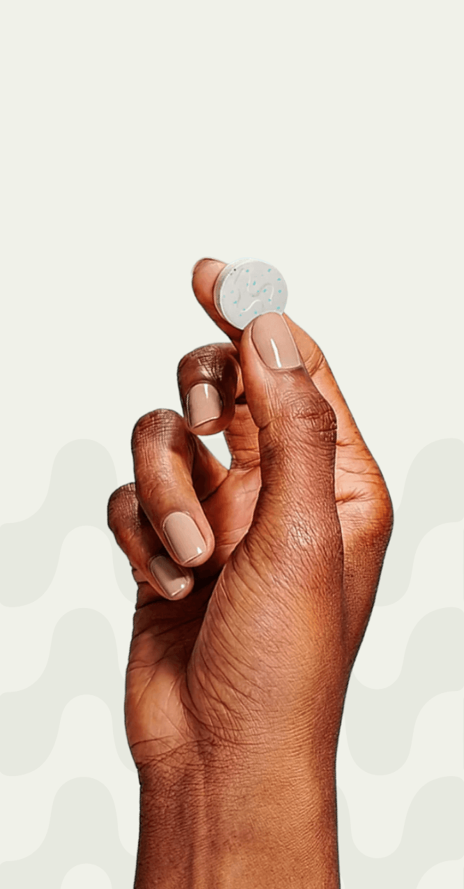 women holding a supplement pill