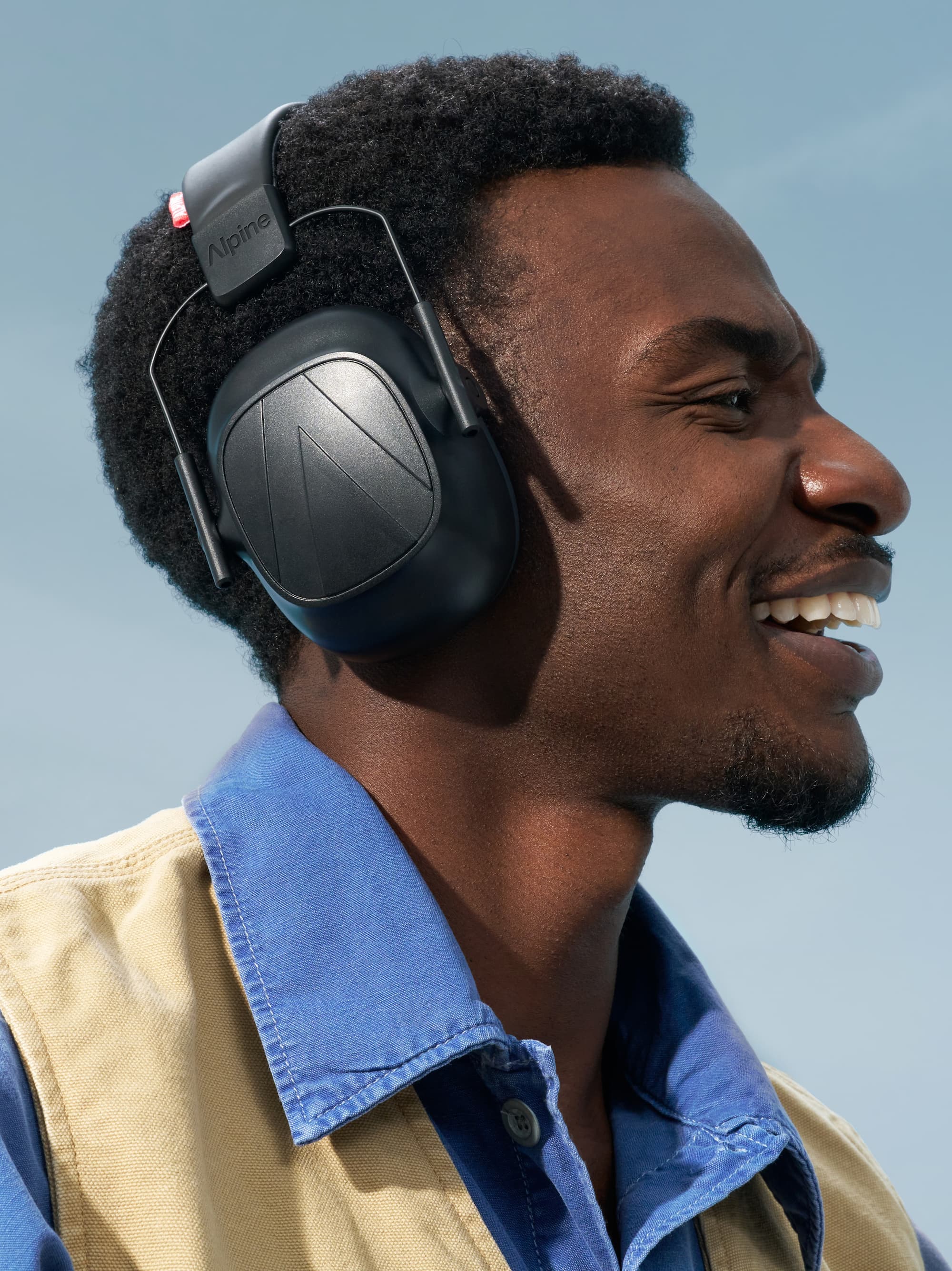 A person wearing a Defend Alpine Hearing