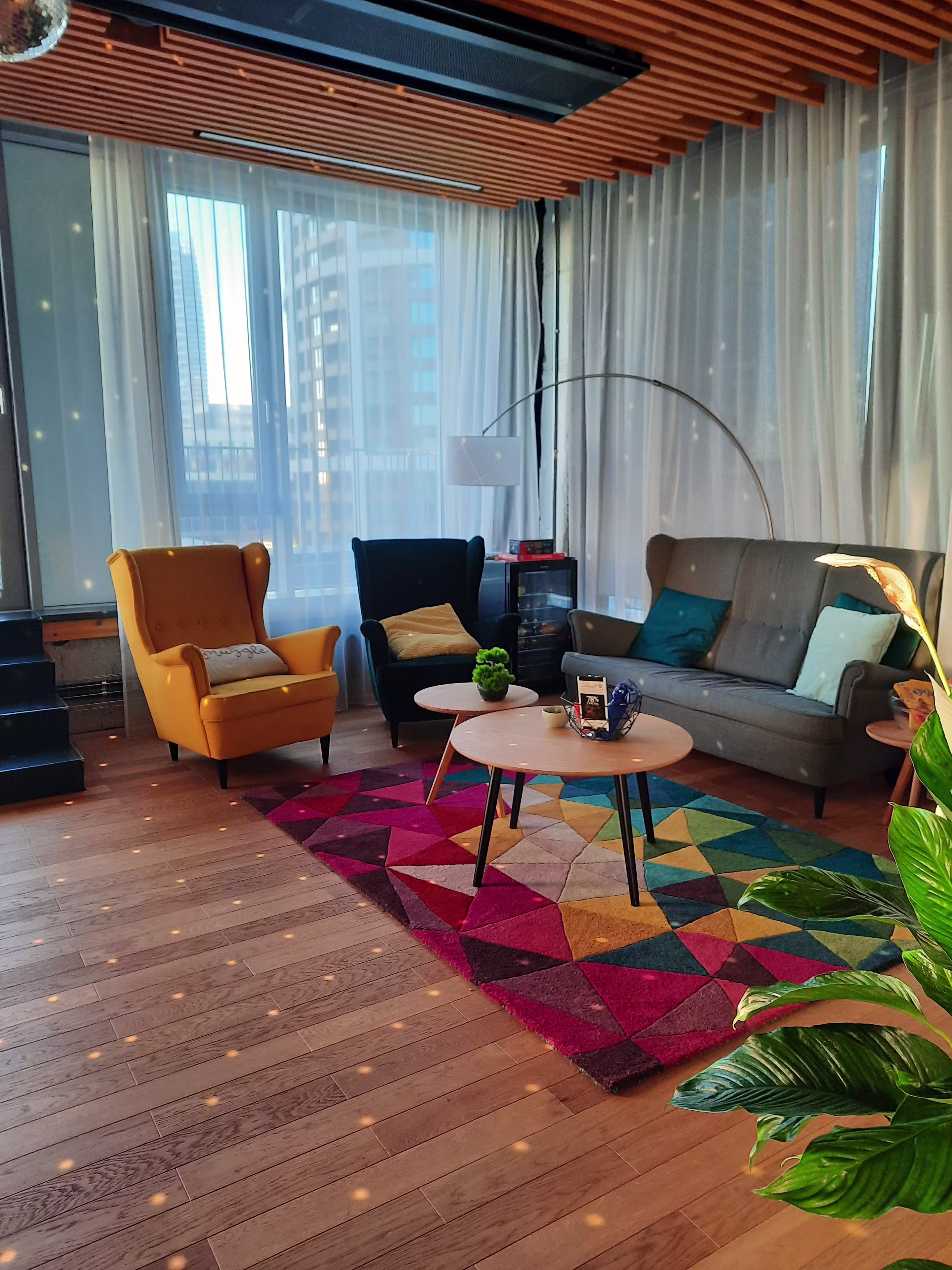 Inside the office in Bratislava, featuring a sitting and lounging area with couches and chairs