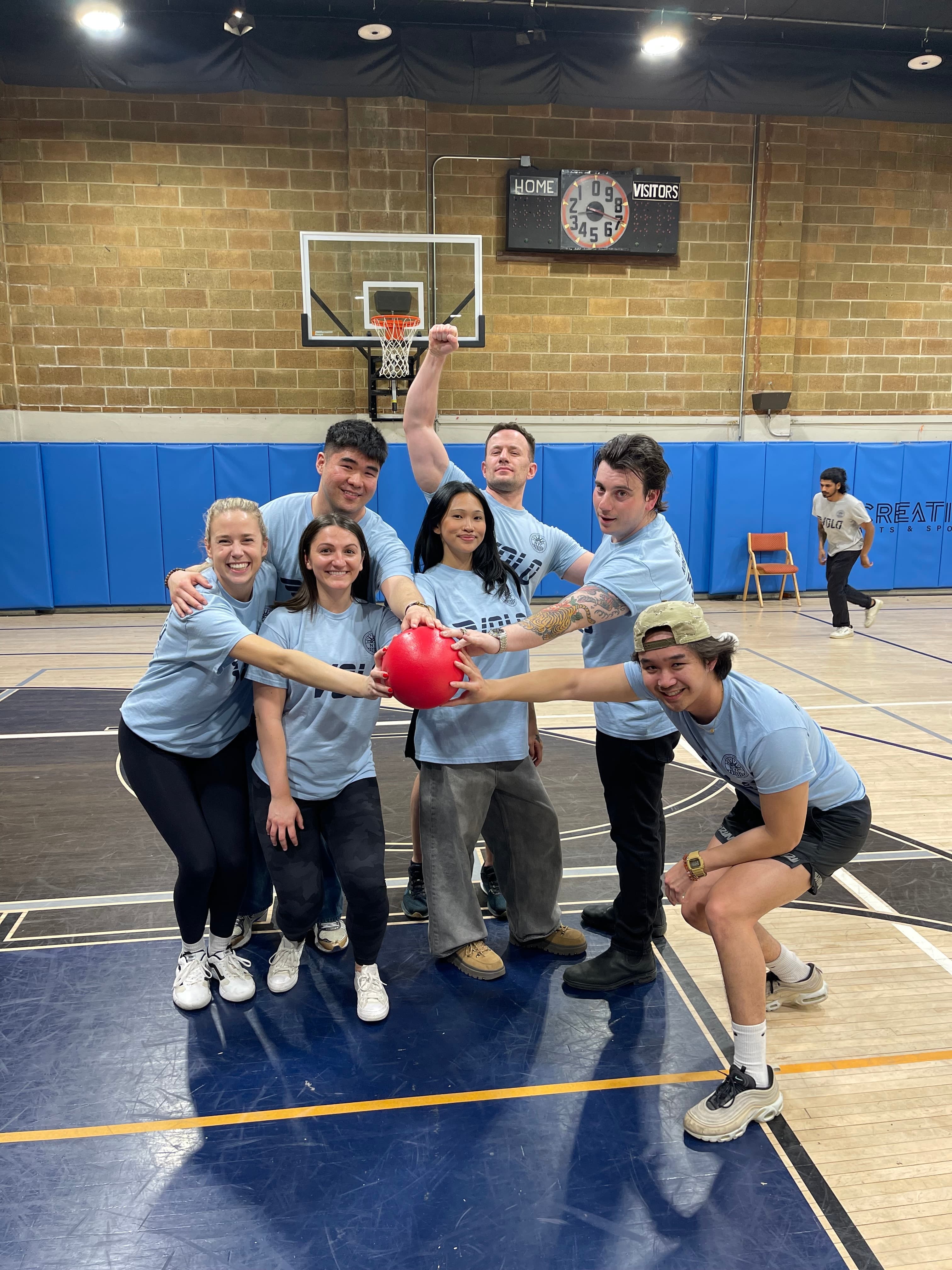 Front Row dodgeball team celebrates after a win