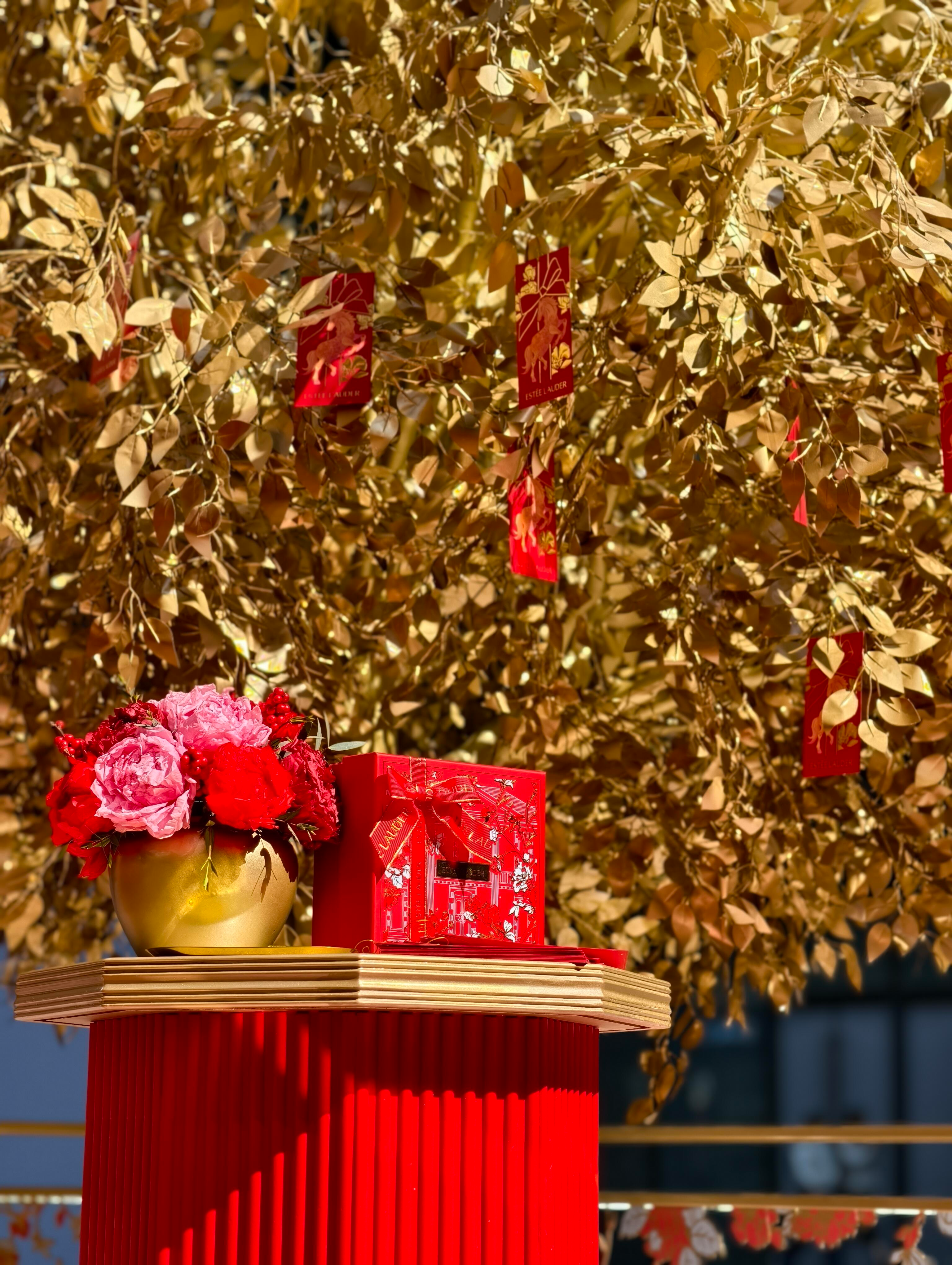 Estee Lauder popup through the trees