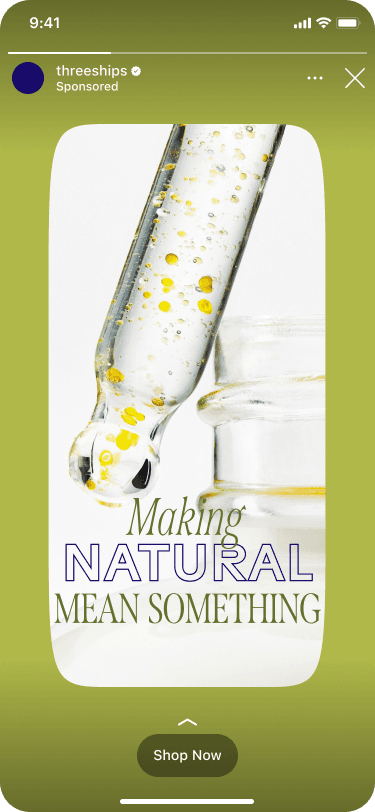 A dropper with yellow liquid next to a glass jar, on a green background, with the text "Making Natural Mean Something."